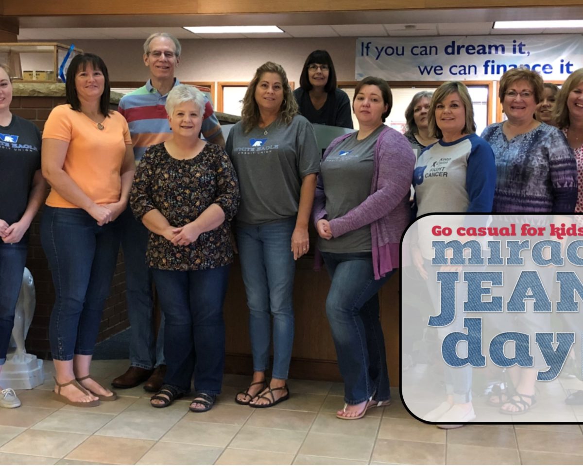 Group wearing jeans for Kansas Miracle Network